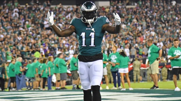 Eagles wide receiver A.J. Brown (11) looks to the camera in the end zone before a game.